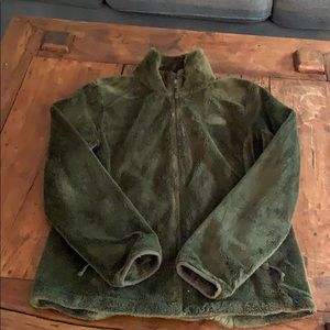 Moss green “The North Face” coat. Fall or winter